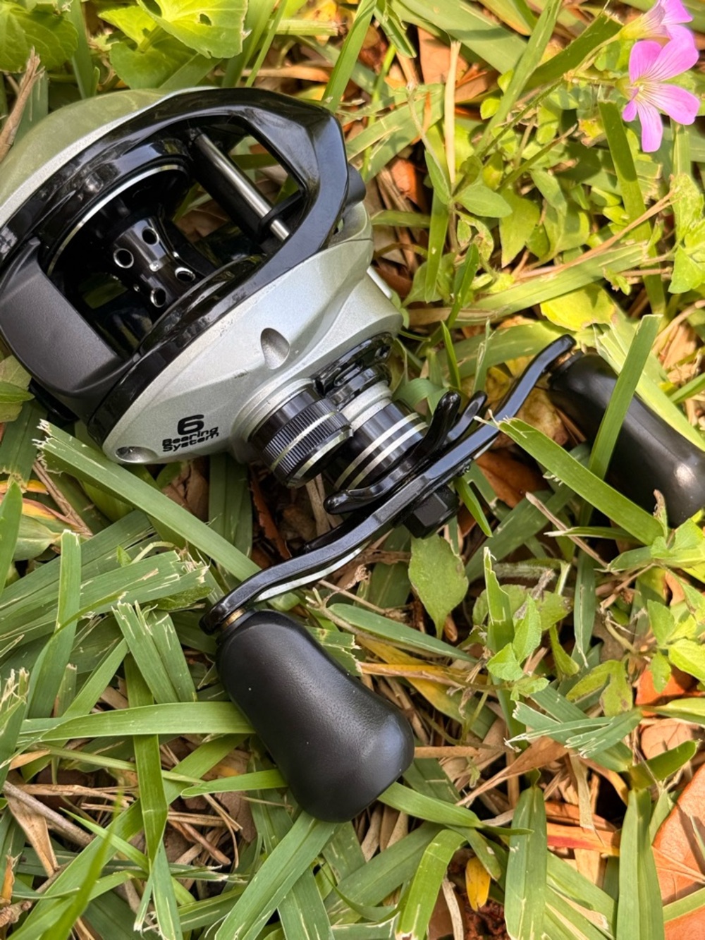 6.3: Right-Hand Baitcasting Fishing Reel in Silver and Black